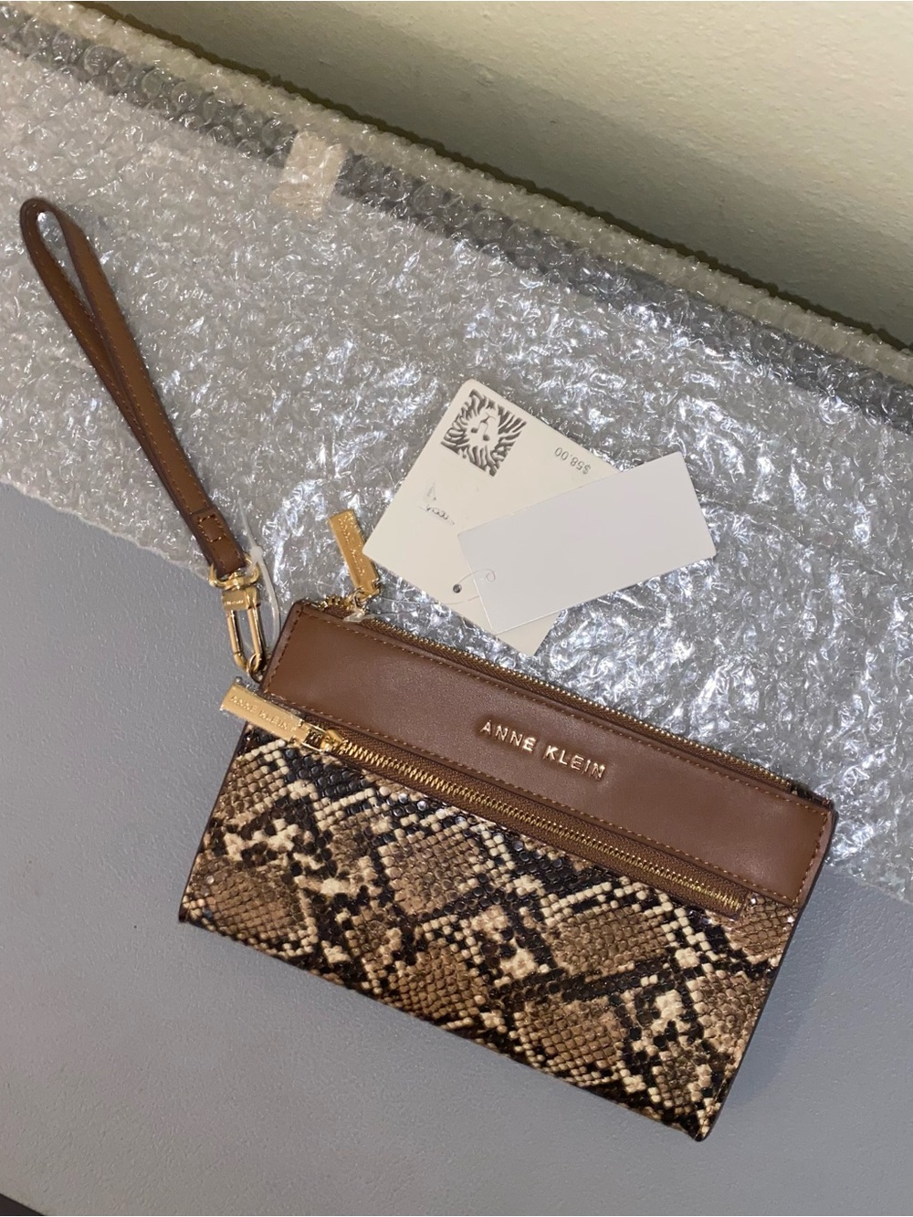 Anne Klein Snake-Print Wristlet Clutch with Gold Hardware, Chestnut Brown
